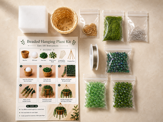 Green beaded hanging plant DIY kit materials with glass beads, woven basket, moss, foam, wire, chain, and instructions.