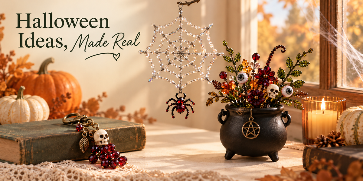 Warm Halloween scene with a clear beaded spider web, witch cauldron plant, skull charm, pumpkins, and candlelight