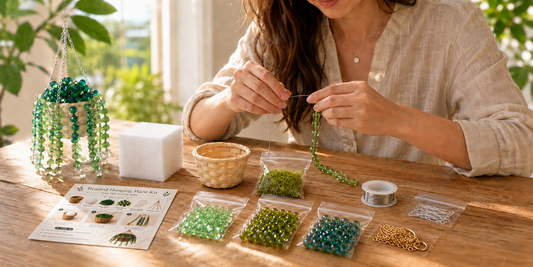 Hands making a beginner-friendly beaded plant DIY kit with green glass beads, craft wire, moss, and a small woven basket on a bright table.