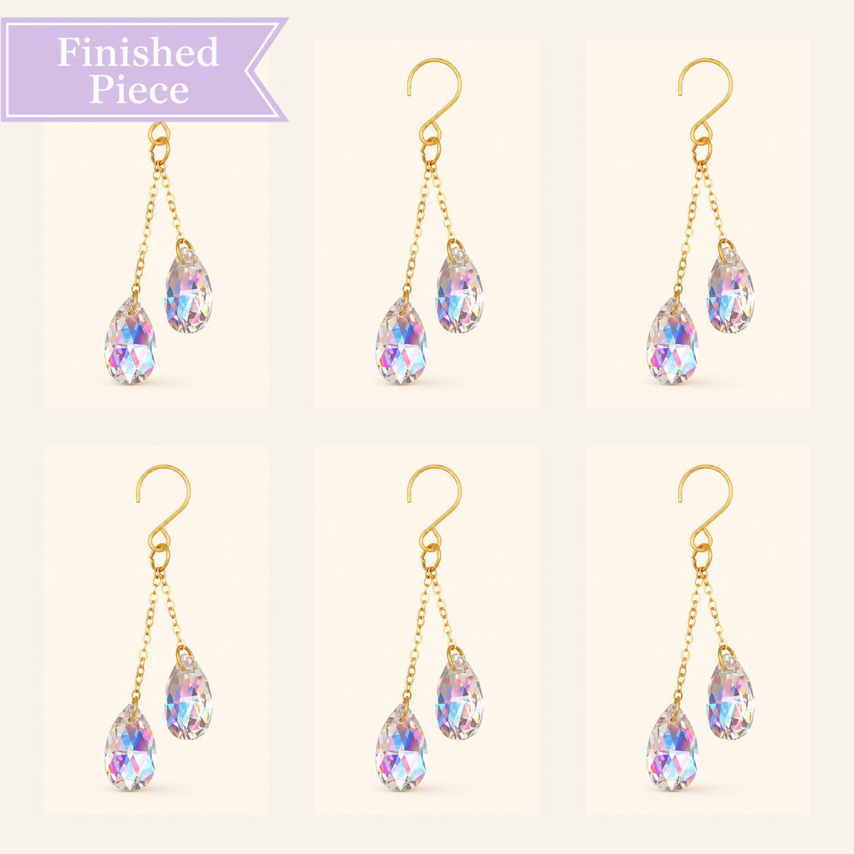 Six AB iridescent crystal plant vine suncatcher charms with gold-tone hooks arranged on a warm ivory background.