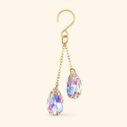 Close-up of one AB iridescent crystal plant vine charm with a gold-tone hook and two rainbow-coated teardrop prisms.