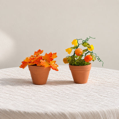 Pumpkin and maple leaf mini beaded plants shown together