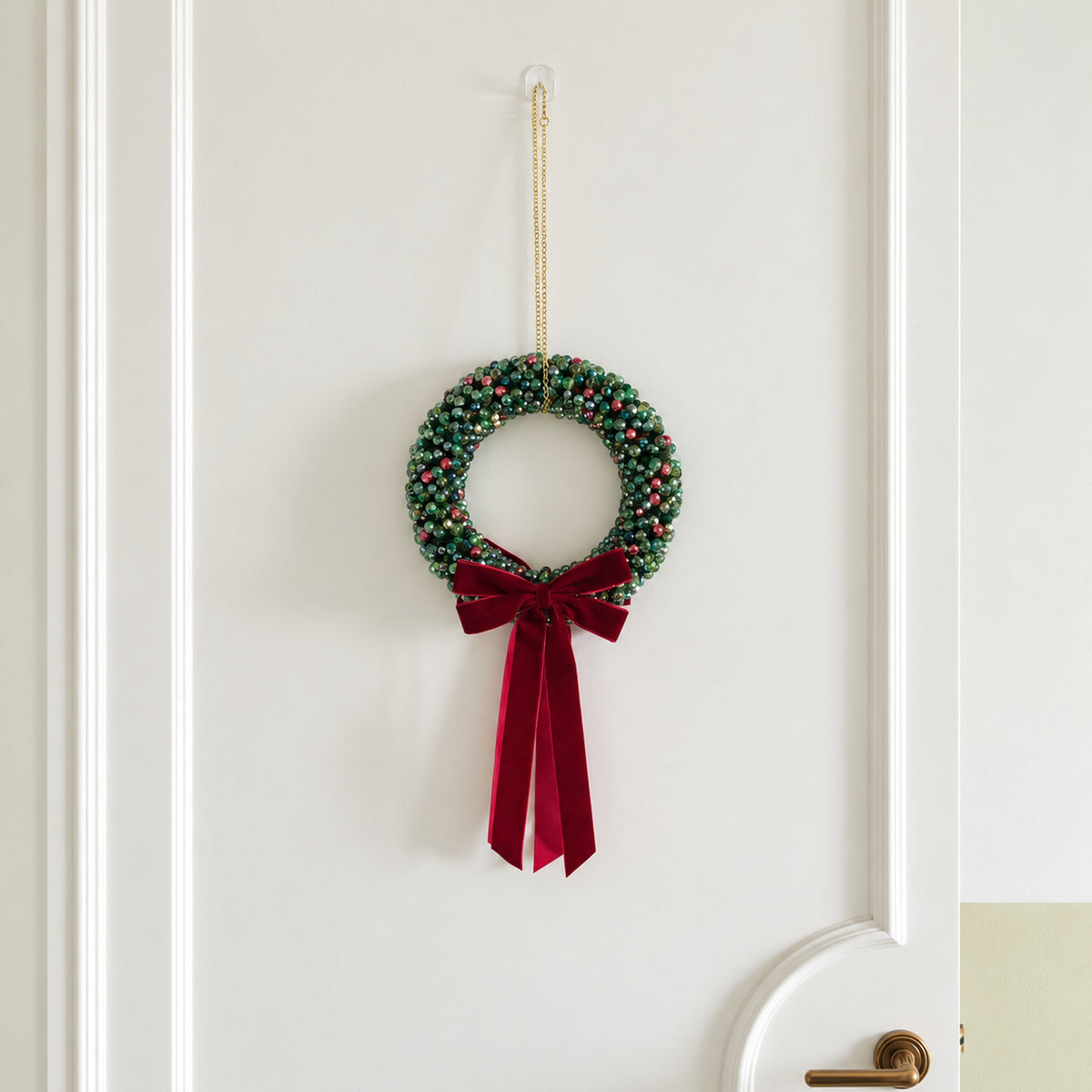Large Full 20 cm beaded Christmas wreath displayed on an interior door