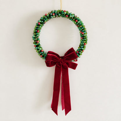 Close-up of Large Slim 21 cm Christmas wreath with 450 beads and red velvet ribbon