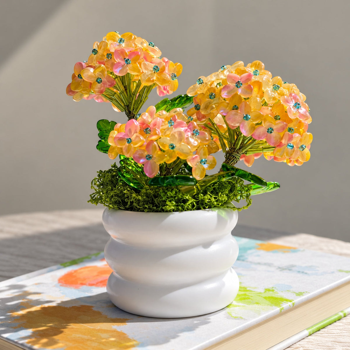Beaded hydrangea tabletop arrangement in bright natural light
