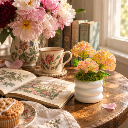Beaded hydrangea arrangement styled on a reading table