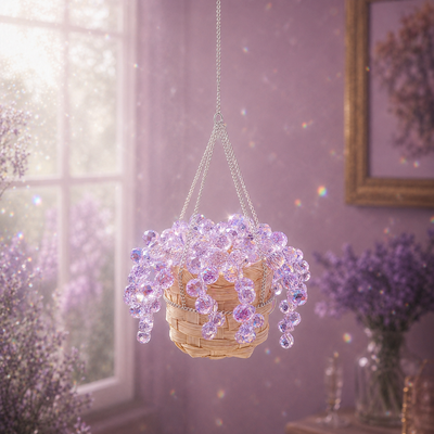 Mini purple Mermaid's Tears finished beaded plant sparkling beside a dreamy sunlit window.