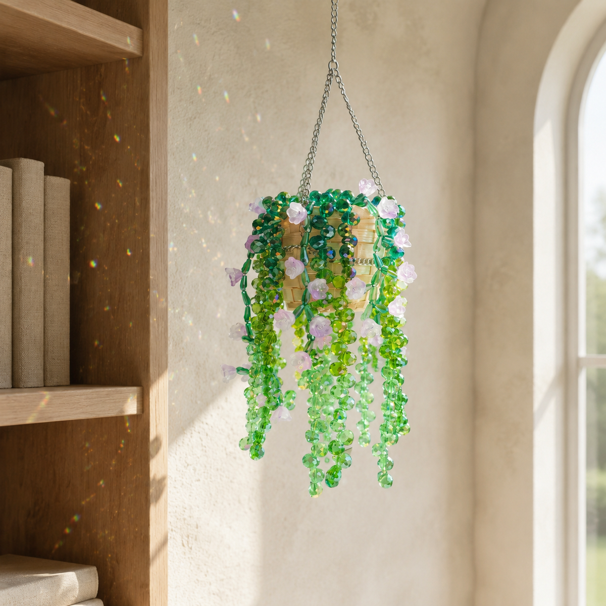 Full cascading wisteria beaded hanging plant displayed in a sunlit reading nook