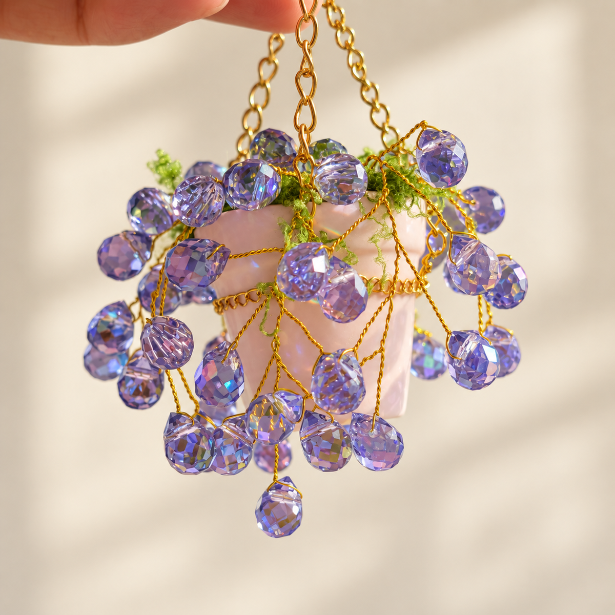 Purple beads and ceramic pot close-up
