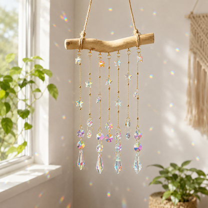 Starlight Driftwood hanging decor sparkling in natural light beside a window.